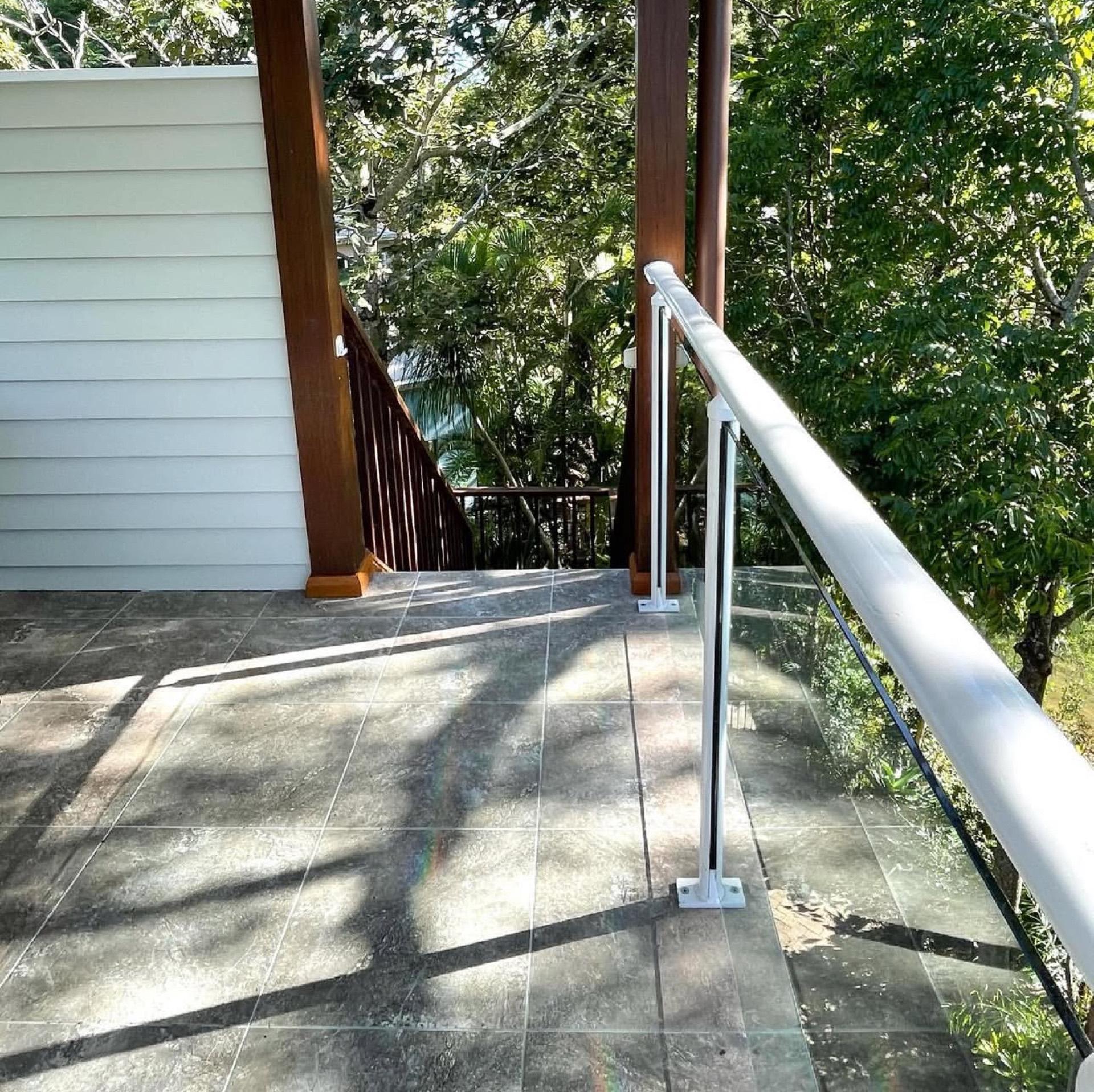 Tiled balcony with glass and aluminium handrail, Gold Coast